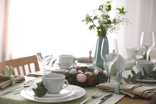 Beautiful Easter Table Setting With Festive Decor Indoors