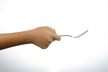 Wall Mural - a man hand holding a silver fork isolate on white background