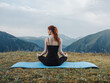 © SHOTPRIME STUDIO - Woman sitting on a mat meditation yoga asana nature fresh air