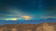 © realstock1 - The four hikers walking on the night mountain background