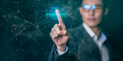 Wall Mural - man and digital technology, asian ceo business man finger scan touch cyber world digital screen in c