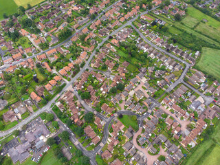 Canvas Print - Aerial photo of the UK British town of Wheldrake that is in the City of York in West Yorkshire, showing a typical UK housing estate and rows of houses