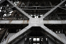 Detail Of The Metallic Structure Of The Tower. Old Iron Tower With Rivets