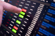 © jes2uphoto - stock exchange monitor screen closeup on tablet with businessman finger analysis while open market for trading sell and buy stock online. business economic and finance