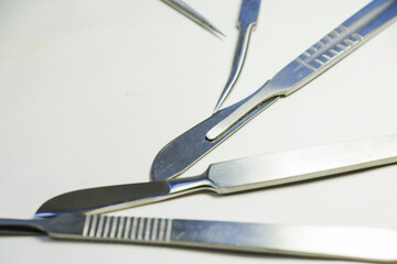 Poster - Isolated shot of some surgery instruments made of stainless steel on white background