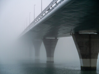 Puente de la Constitucion, called La Pepa, in the fog in the bay of Cadiz capital, Andalusia. Spain. Europe.
