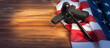 Judge gavel and gun on USA flag. Gun law concept