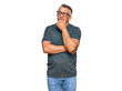 © Krakenimages.com - Middle age grey-haired man wearing casual clothes and glasses serious face thinking about question with hand on chin, thoughtful about confusing idea