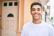 © Krakenimages.com - Young latin man smiling happy walking at the city.