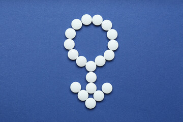 Wall Mural - Male sign made of white pills on blue background, flat lay. Potency problems