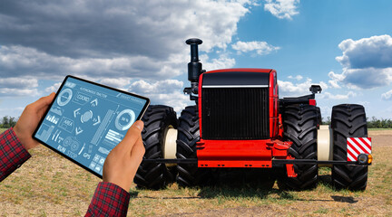 Aufkleber - A farmer with digital tablet controls an autonomous tractor on a smart farm	
