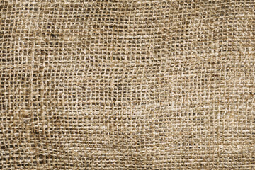 Wall Mural - Natural brown linen fabric background. Fiber structure texture. Vintage canvas pattern. Rustic decoration pattern. Antique hessian bag textile background.