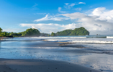 Wall Mural - Manuel Antonio beatiful tropical beach with white sand and blue ocean. Paradise. National Park in Costa Rica, Central America.