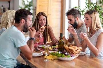 Wall Mural - Friends have lunch at home