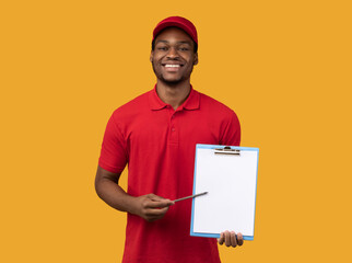 Wall Mural - African american delivery man showing folder and pen