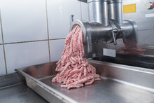 In The Kitchen, Creating Minced Pork Meat Through A Meat Grinder