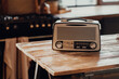 © muse studio - an old vintage radio receiver sits on a wooden table. stylish old kitchen morning in the village and daylight from the window. copy space