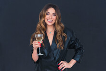Beautiful Young Woman Leather Jacket Hold Glass Of Champagne And Smile