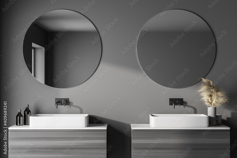 Modern bathroom with gray walls, double sink with round mirrors and left window light. 3d rendering - obrazy, fototapety, plakaty 