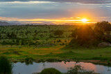 Fototapeta Natura - Beautiful and dramatic african landscape, sunset in Serengeti