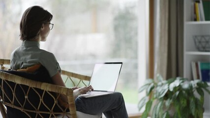 Wall Mural - Young woman using laptop computer at home, Student girl working in her room, Work or study from home, freelance, business lifestyle concept.