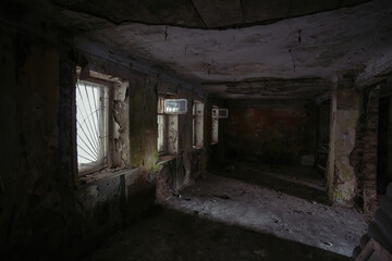 Sticker - Interior of messy dirty room at old abandoned building