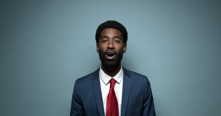 Poster - Beautiful happy handsome man with facial expressions in front of a colored background