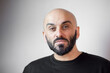 © stivog - Close-up portrait of bearded bald man. White background
