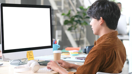 Computer screen mockup, template background, Office man typing computer with blank screen at coworking space, office, Business online, e commerce, online education learning concept