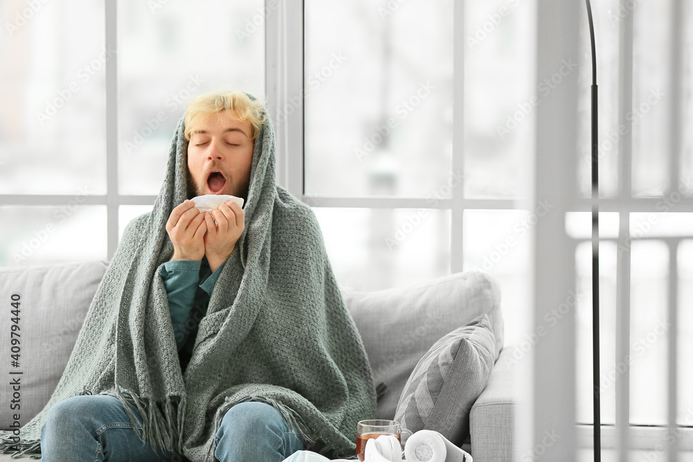 Sick young man at home