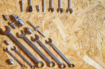 Wall Mural - set of various repair hand tools or auto mechanic's tools. repair tool kit. equipment for building. wooden background, pattern, top view. space for text