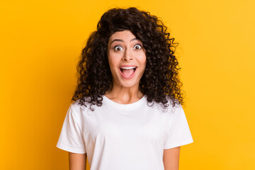 Wall Mural - Photo of young happy excited crazy shocked amazed surprised girl sees big sale discount isolated on yellow color background