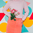© Katya Havok - Model in pink clothes holds spring flower bouquet on colorful background. Modern creative Valentines or woman's day concept. Pop art style