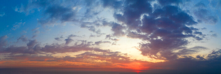 Wall Mural - panorama sunrise sky and cloud at morning background image . panorama sky and cloud.
