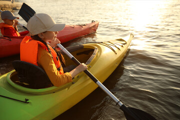 Poster - Little children kayaking on river. Summer camp activity