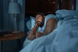 canvas print picture - people, bedtime and rest concept - indian man sleeping in bed at home at night