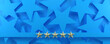 © Sign Maker - 5 gold stars on a blue starry background, luxury and rating concept. 3d render.