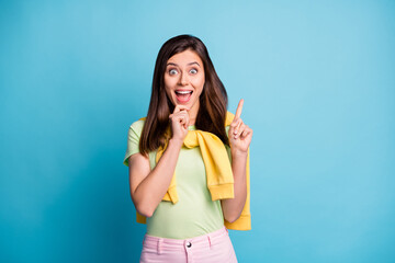 Sticker - Portrait of lovely amazed cheerful girl demonstrating great solution clue copy space isolated over bright blue color background