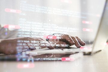 multi exposure of abstract programming language hologram with hands typing on computer keyboard on b