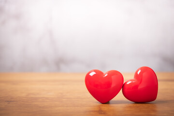 Red heart on wooden background, valentines day card concept,