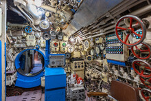 Interior Of Old Restored Russian Soviet Submarine. Interior Of Combat Submarine Compartment With Devices Of Control