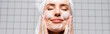 © LIGHTFIELD STUDIOS - happy woman with closed eyes applying foam cleanser in bathroom, banner