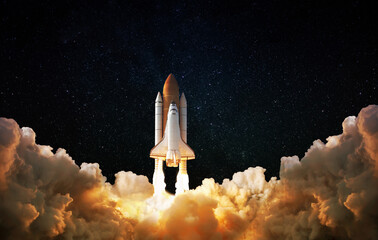 launch of space,spaceship takes off into the night sky.rocket starts into space concept.elements of 