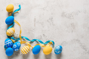 Canvas Print - Composition with beautiful Easter eggs on light background