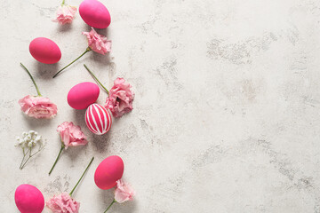 Canvas Print - Composition with beautiful Easter eggs and flowers on light background