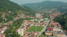 Aerial Truck Shot Over The Valley Town Of Ivanjica In Serbia On A Bright Day.