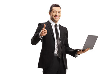 Poster - Smiling businessman with a laptop showing thumbs up