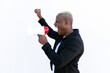 © David Munoz/ADDICTIVE STOCK - Side view of cheerful African American male shouting in loudspeaker while standing with fist up on white background