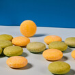© Fernando Valencia/ADDICTIVE STOCK - Natural round shaped soap arranged on two colored background in studio