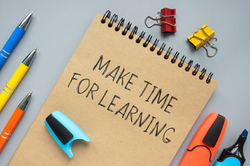 Wall Mural - Make time for learning memo in the notepad.